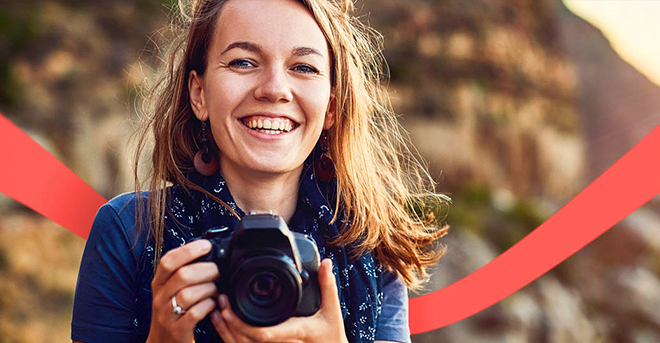 large image of a happy udemy female student